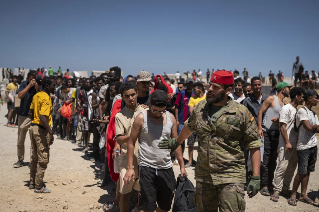Migrants gather in Ceuta