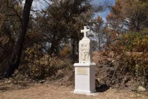 The monument erected for the pilgrimage’s fiftieth anniversary remained unmarked despite the fire’s passage.
