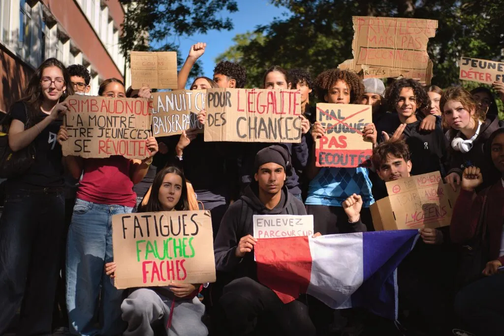 Students rally outside a Paris high school, protesting lack of resources in public education
